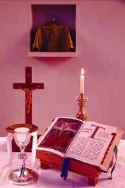 Cross, Candle, and Holy Bible