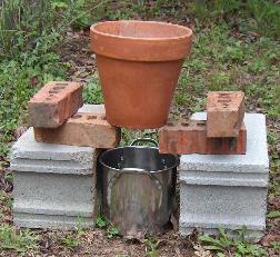 Flower Pot on Bricks with One Gallon Pot Below